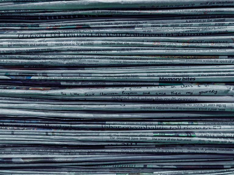 Close up of piled newspapers