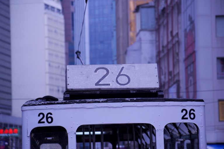 A close up of the number detail on a number 26 bus