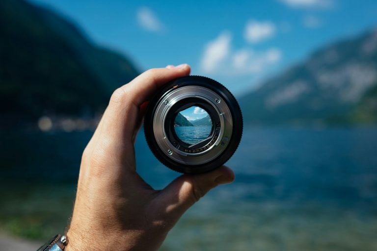 A mountain lake focused through a camera lens.