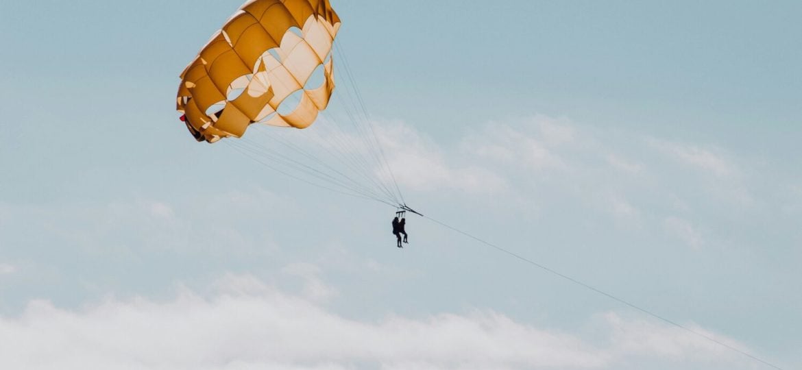 An orange parachute in the sky