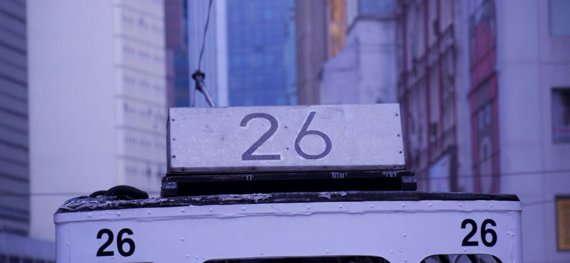 A close up of the number detail on a number 26 bus