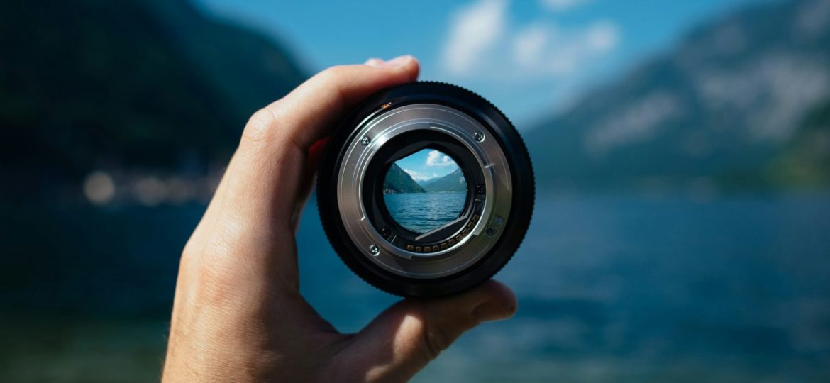 A mountain lake focused through a camera lens.