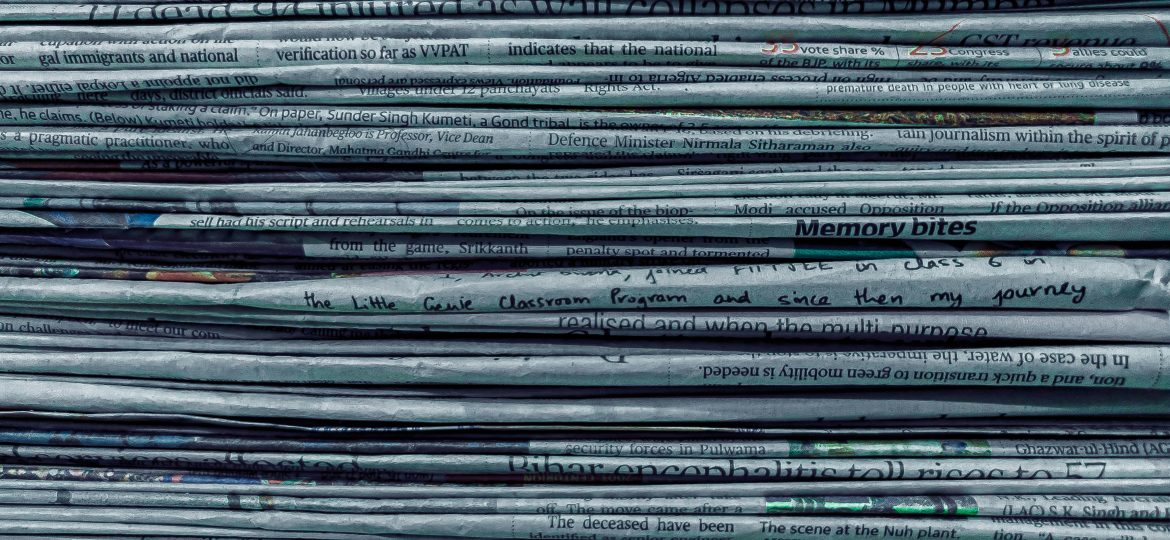 Close up of piled newspapers